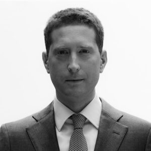 Black and white photo of David Shalleck-Klein who is protecting New York families from unnecessary and harmful separation
