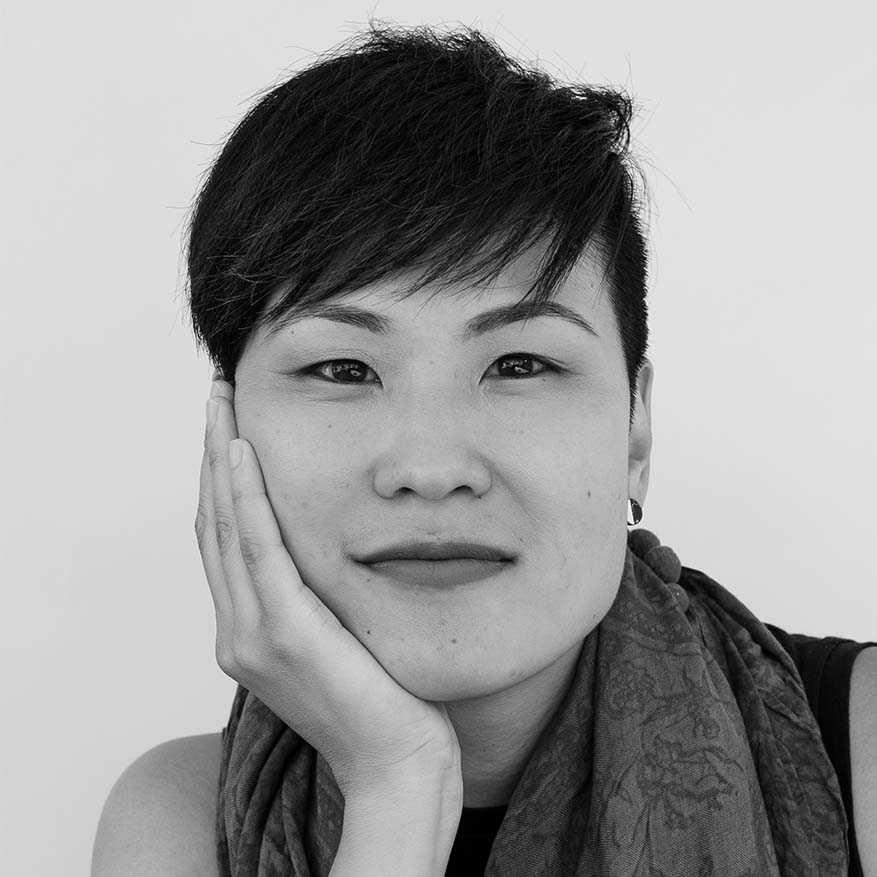 Black and white photograph of Jaime-Jin Lewis, founder of Wiggle Room, a platform to make childcare more accessible for NYC families