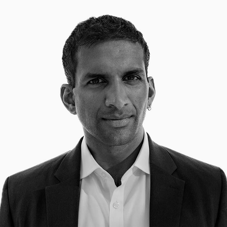 Black and white photograph of Neil Padukone who is strengthening the supply chain and workforce for the region’s transit systems that move New Yorkers, support neighborhoods, and energize the City’s economy