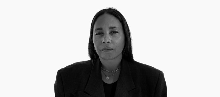 Black and white photograph of Geneva White who is building a more sustainable, inclusive and equitable creative economy in NYC.