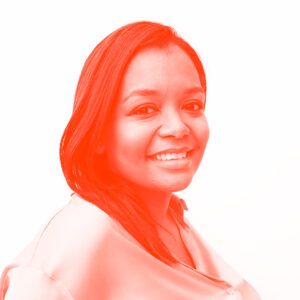 Photograph with a red overlay of Jihan Thompson who is building tech tools and support for NYC hairstylists and cosmetologists who serve communities of color.